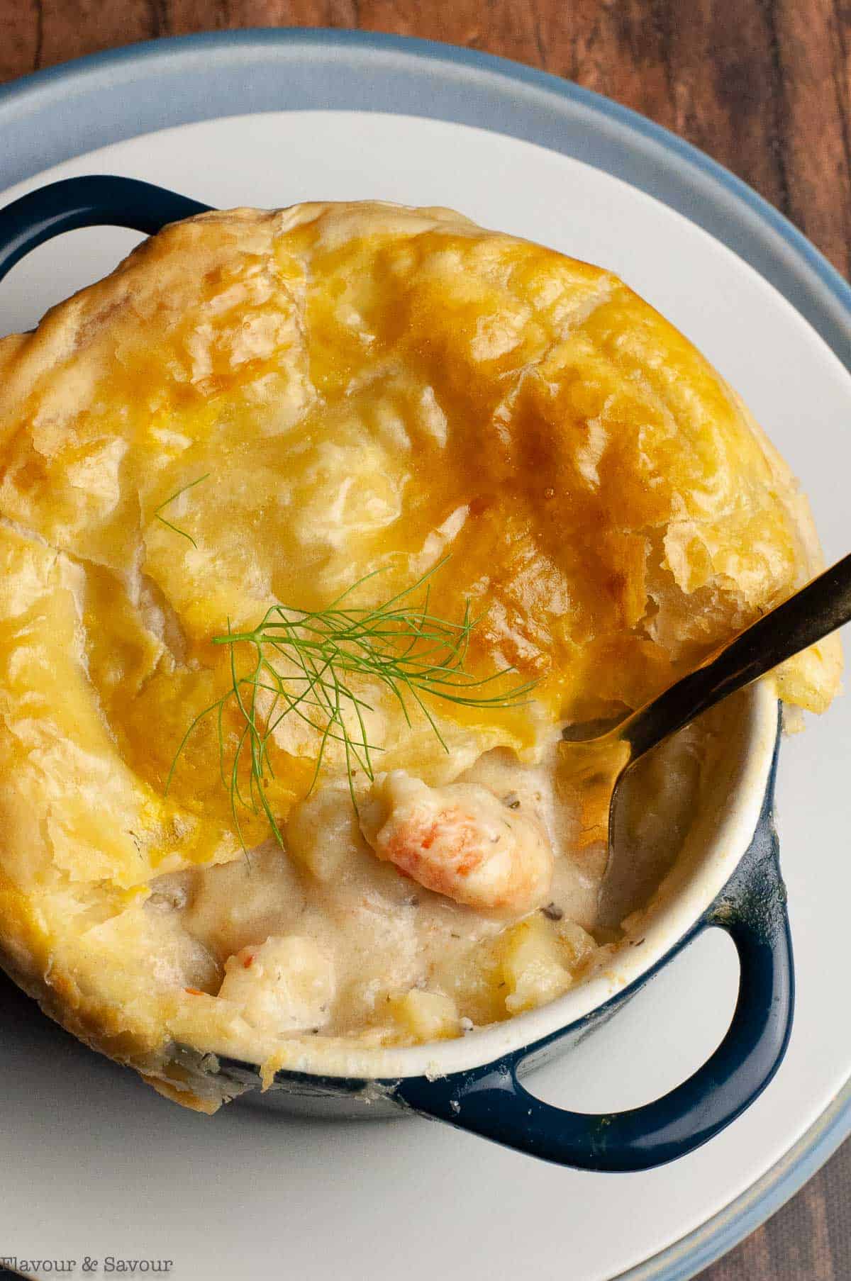 close up overhead view of a single mini seafood pot pie