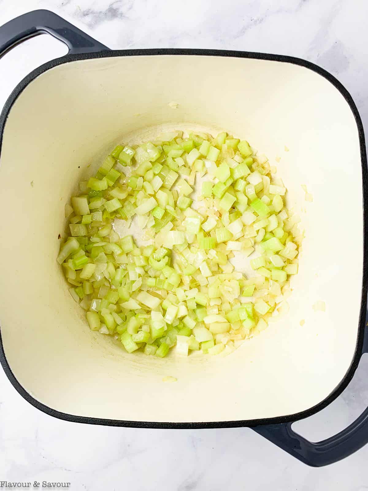celery and onion in a pot