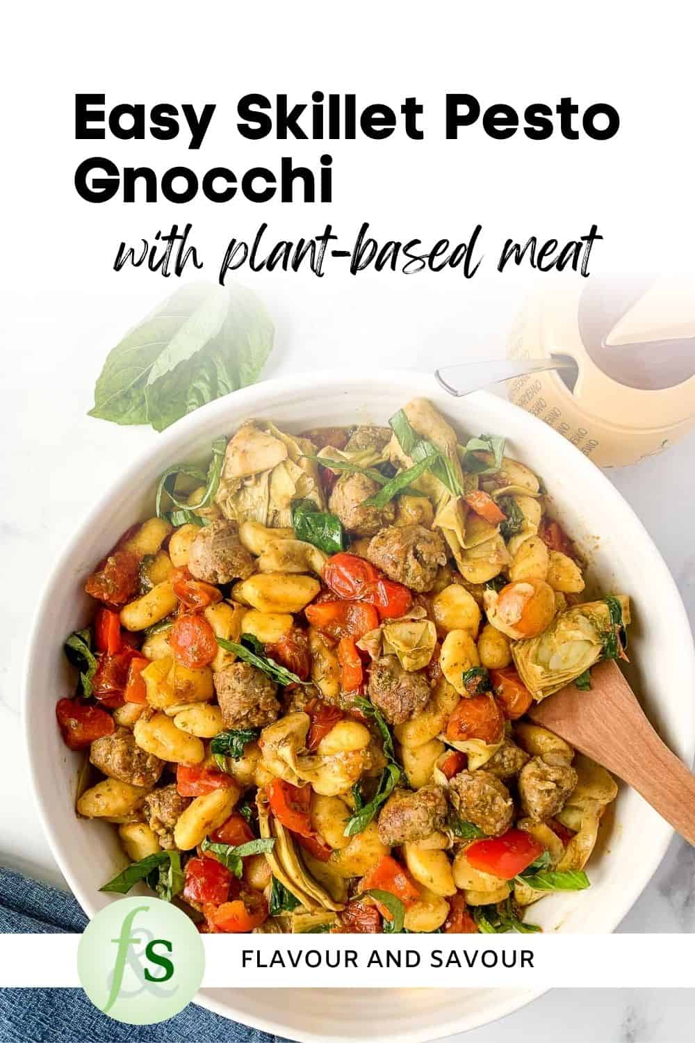 Image with text overlay for Skillet Pesto Gnocchi.