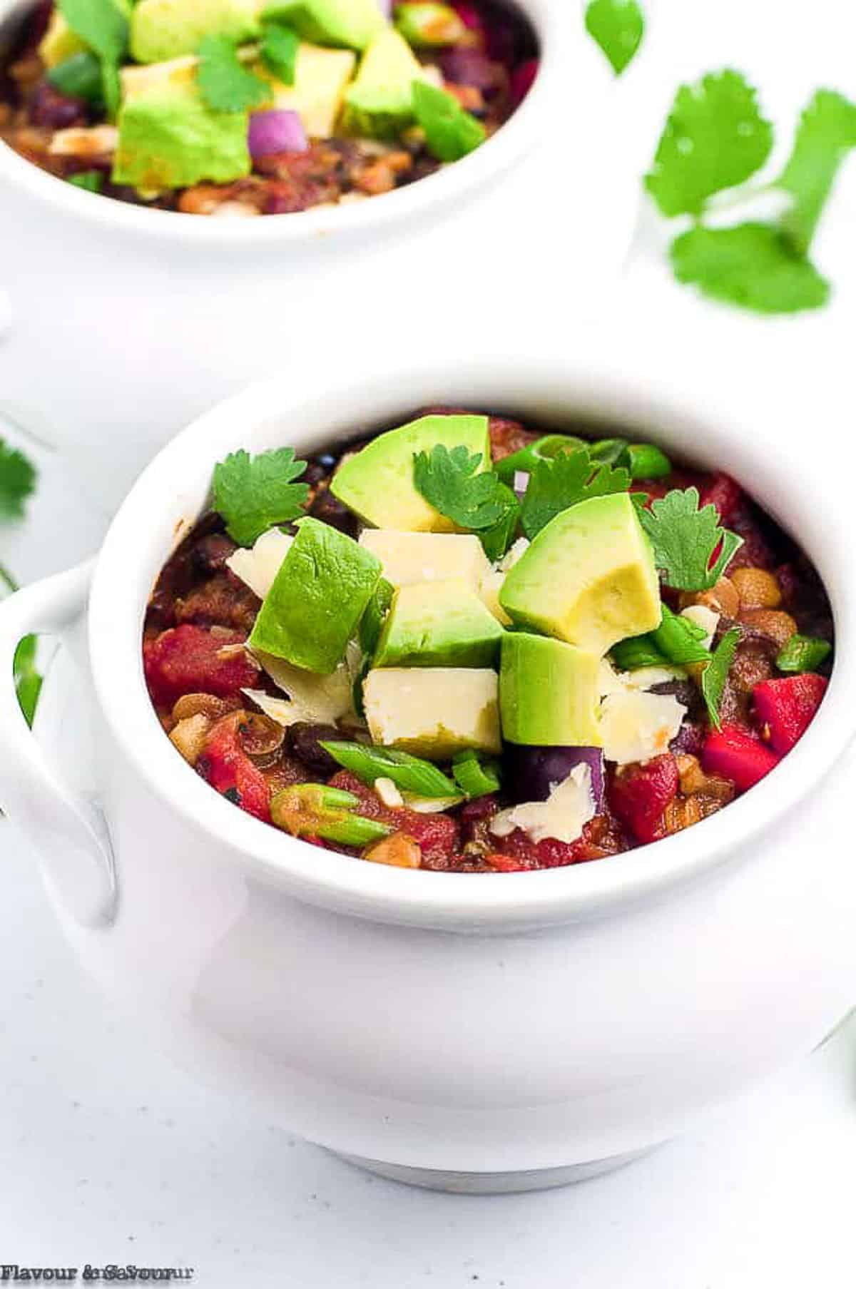 Vegan chipotle chili in a soup tureen.