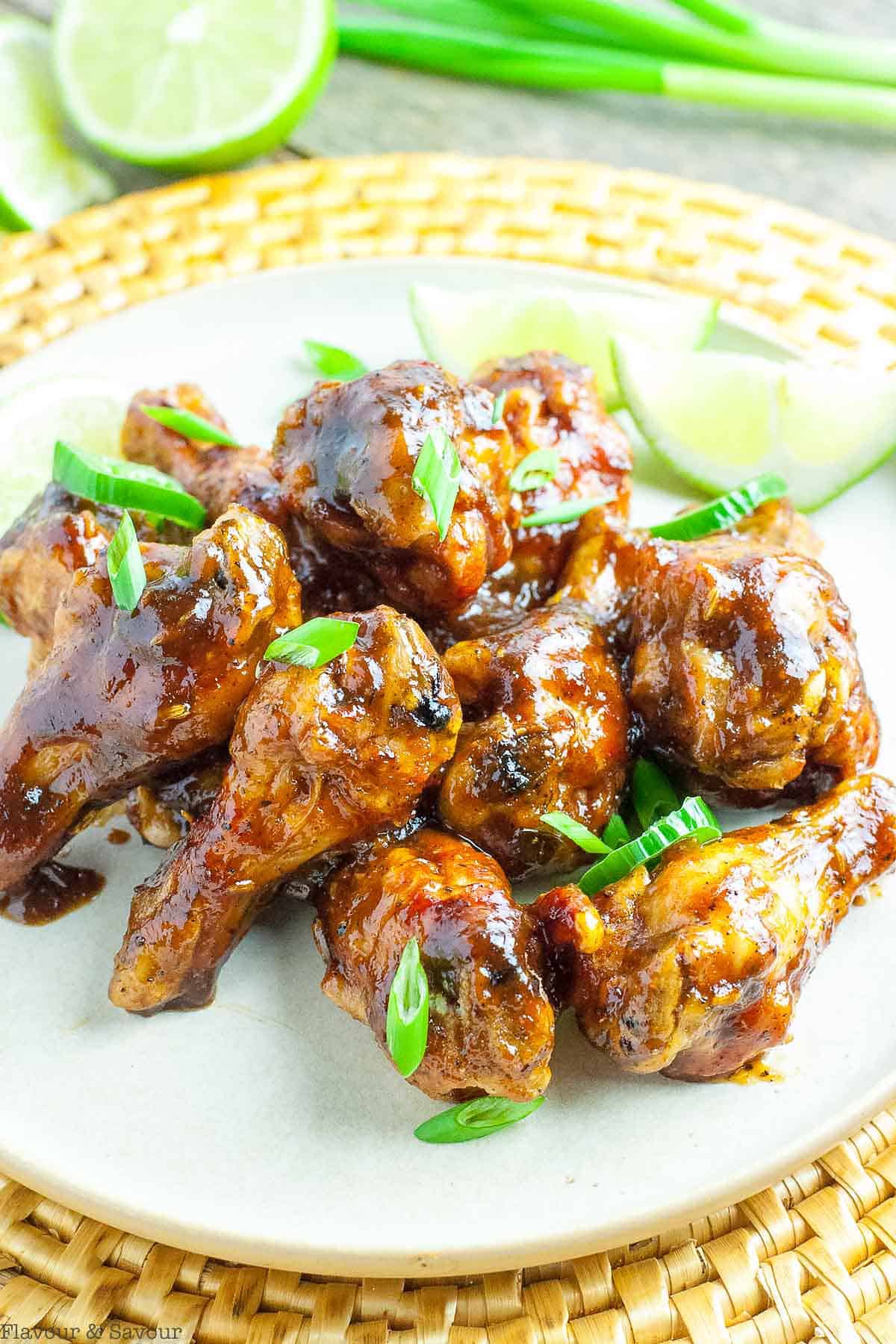 A plate full of Jamaican jerk chicken wings.