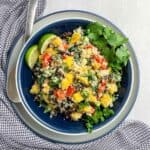 overhead view of a bowl of couscous salad made with cauliflower couscous