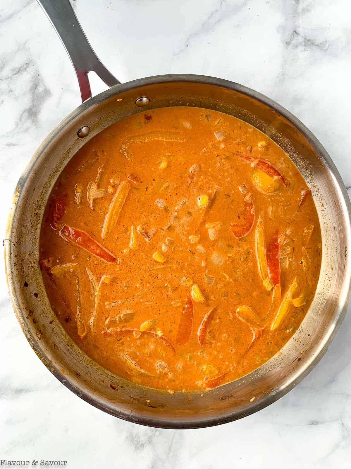 coconut curry sauce in a skillet