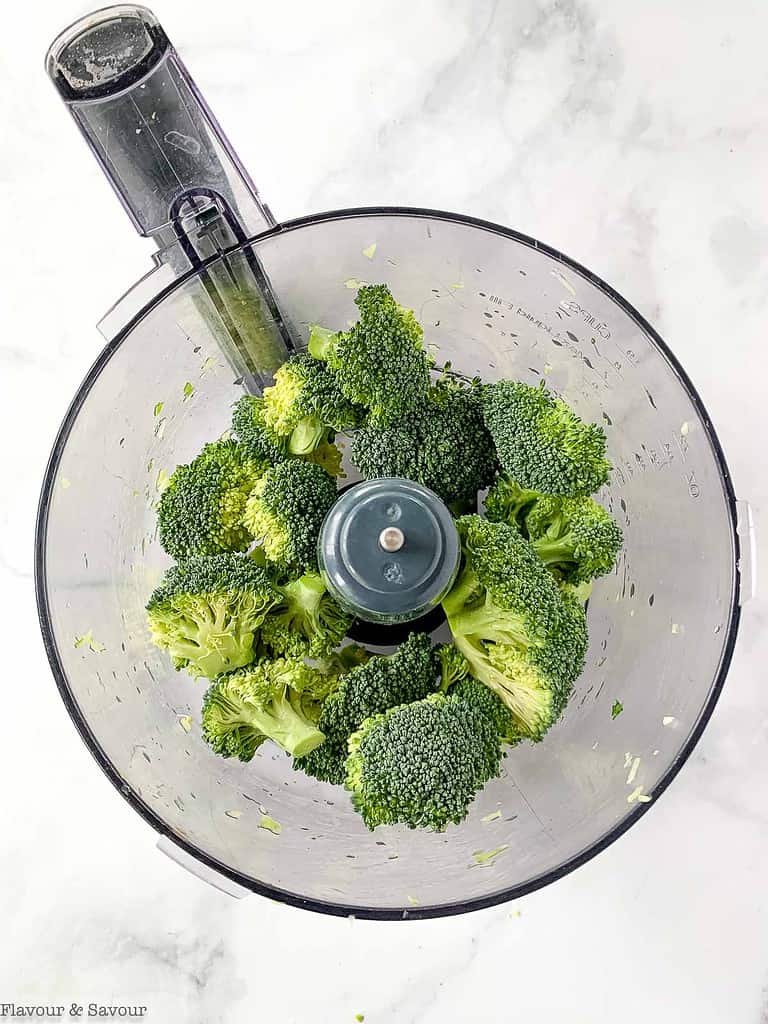 broccoli in the bowl of a food processor