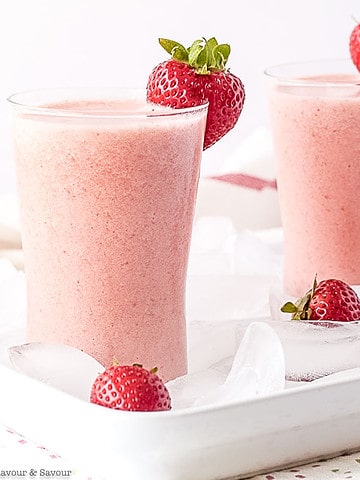 two glasses of strawberry watermelon collagen smoothie