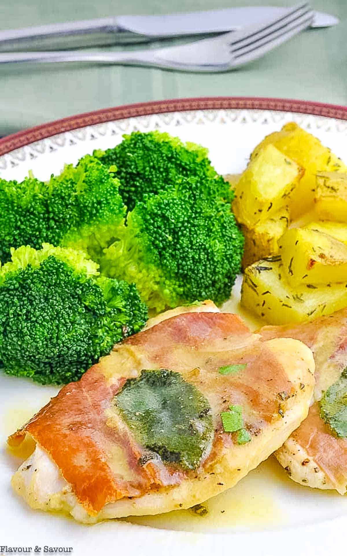 Chicken Saltimbocca with broccoli and roast potatoes.