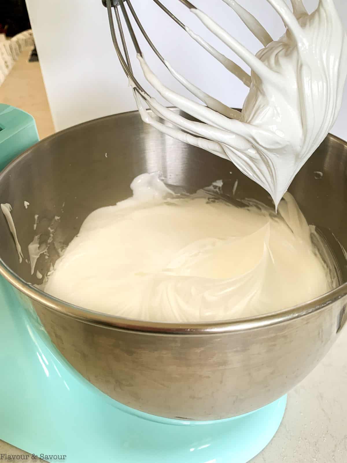 Beaten egg whites in a stand mixer.
