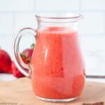 a small jug of strawberry vinaigrette