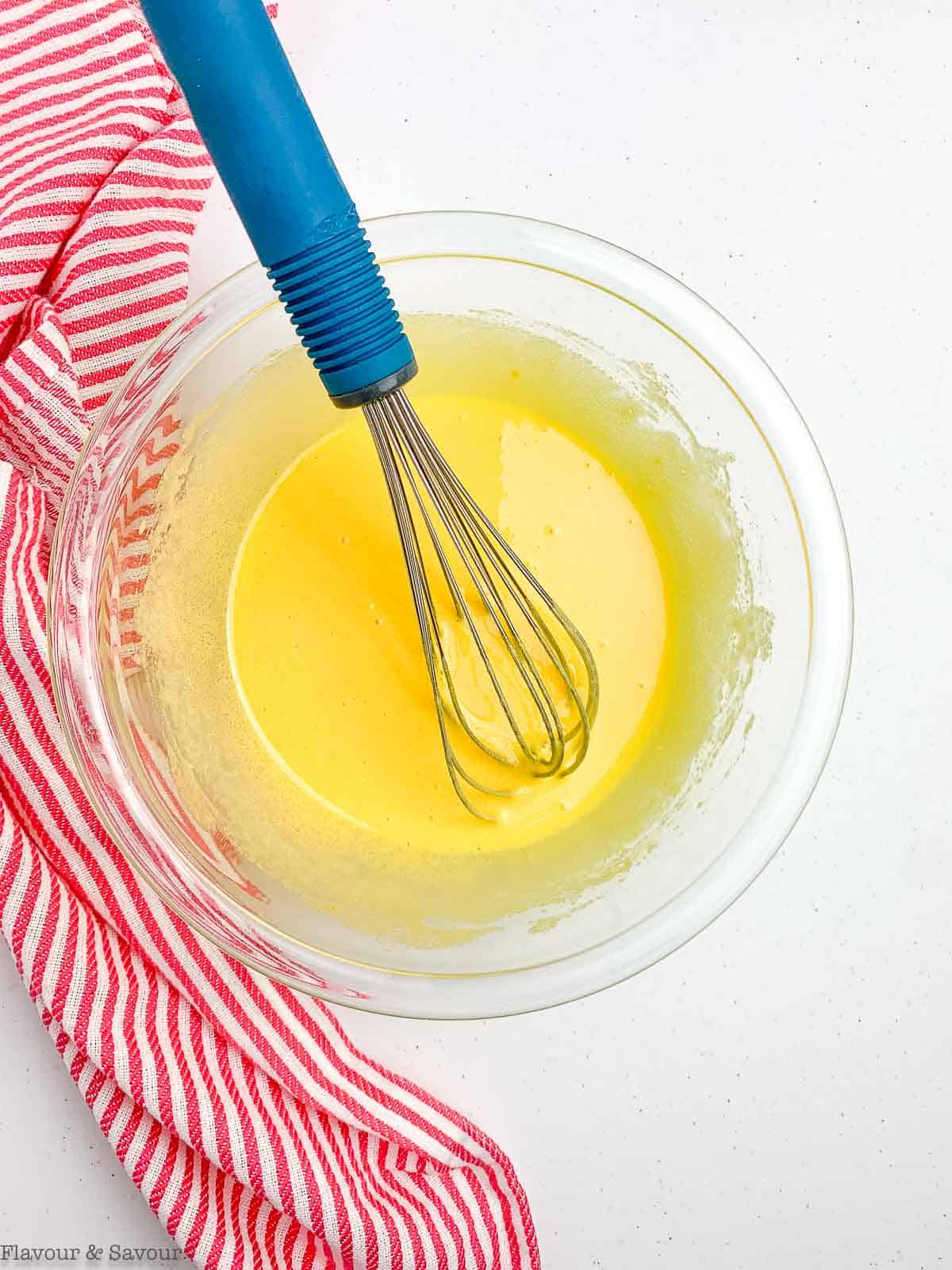 whisking egg yolks