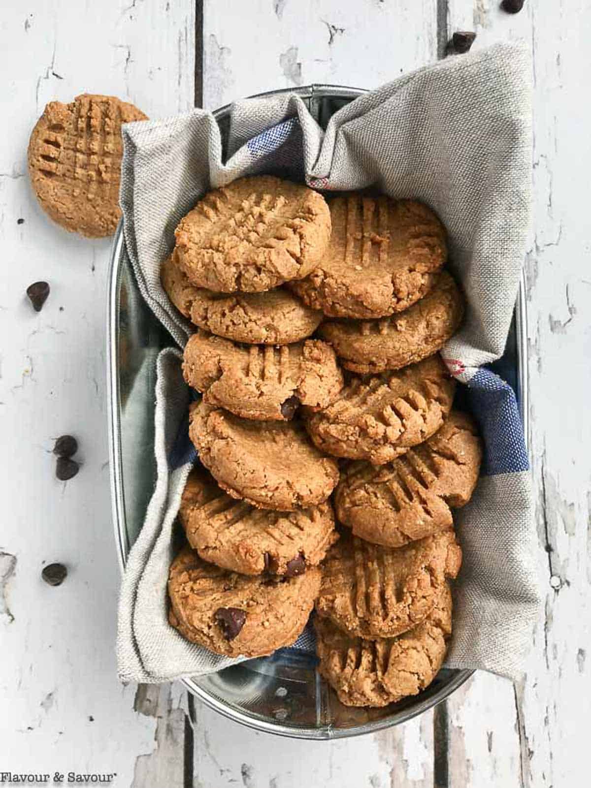 4-ingredient sugar-free peanut butter cookies in a metal serving container.