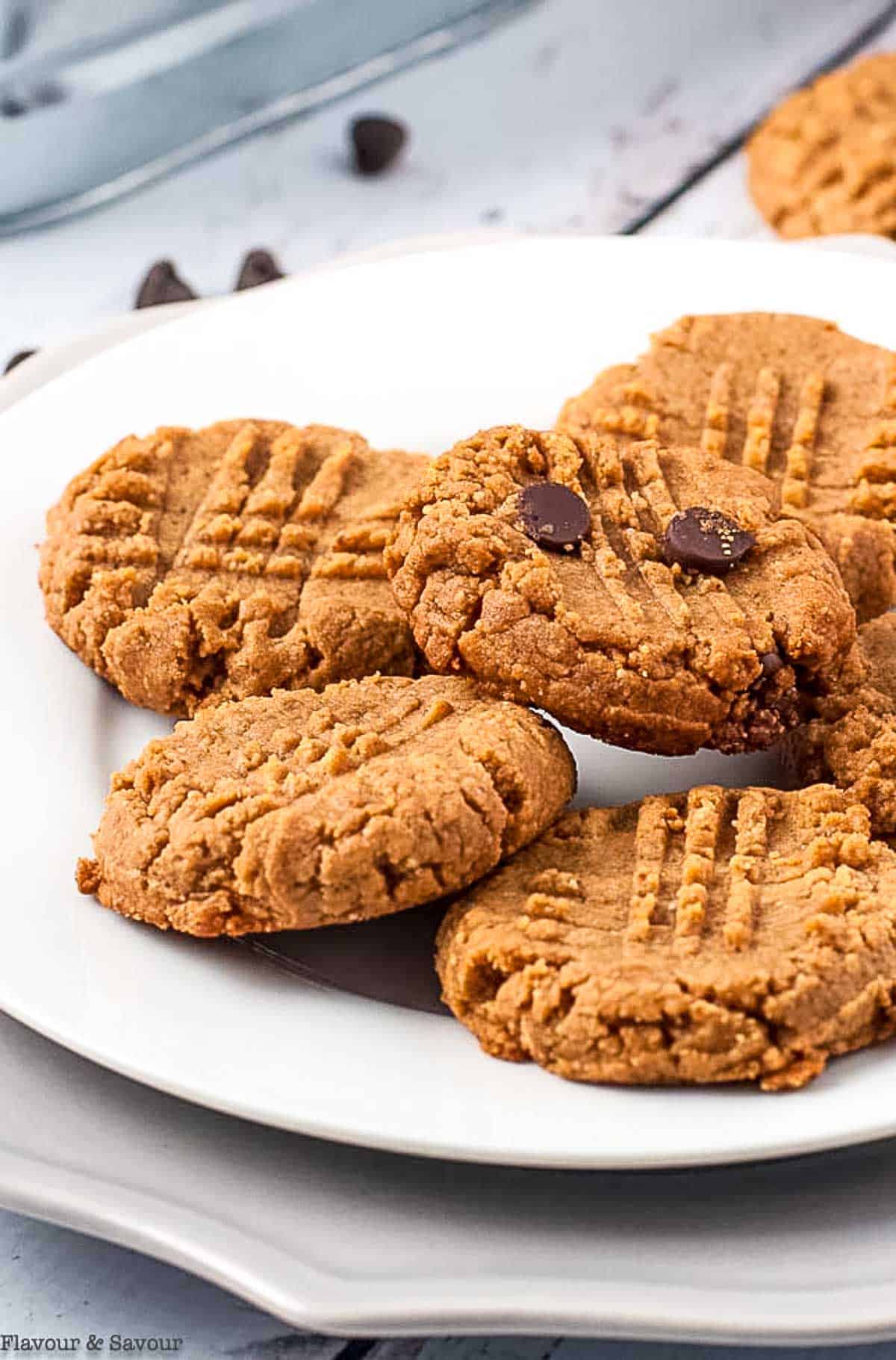 close up view of peanut butter cookies on a plate.