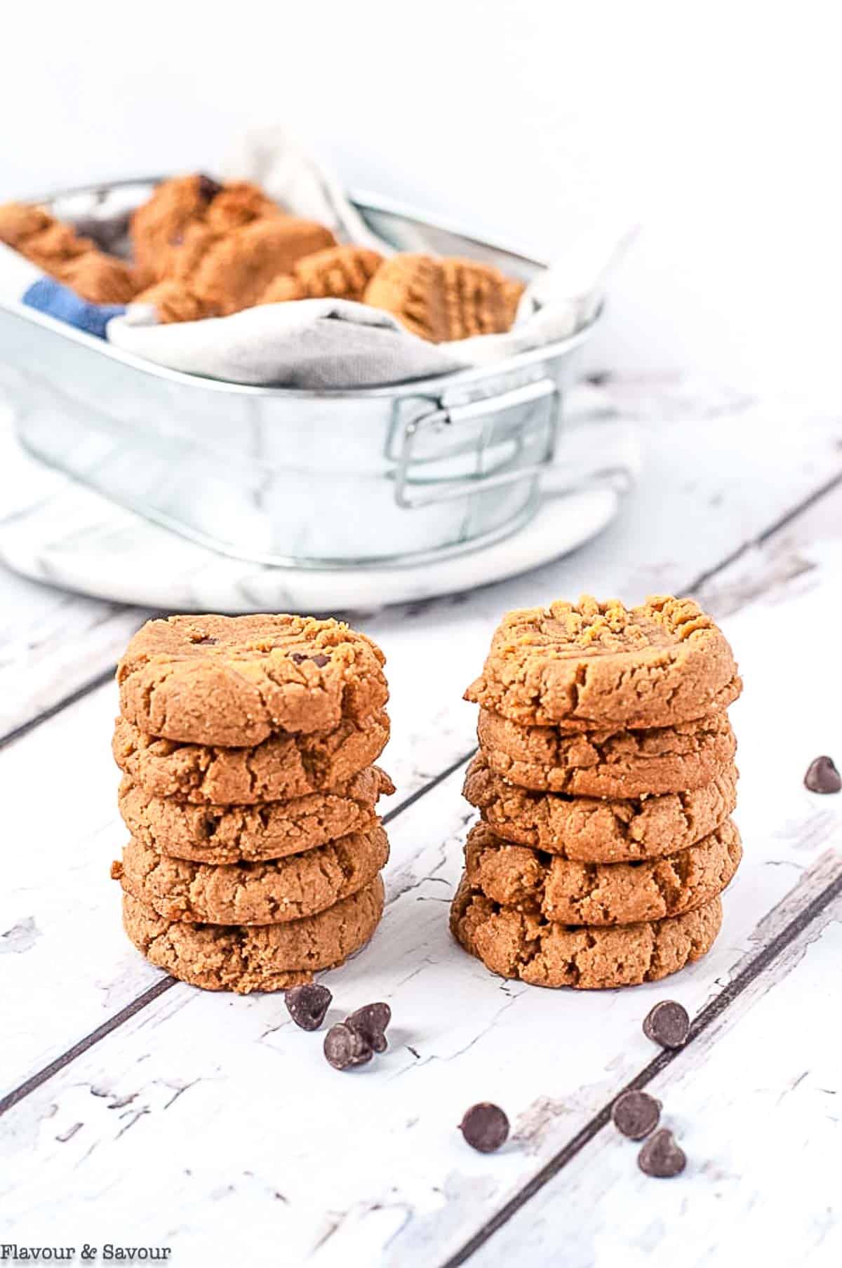 Two stacks of sugar-free flourless peanut butter cookies.