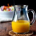 a pitcher of ginger orange dressing.