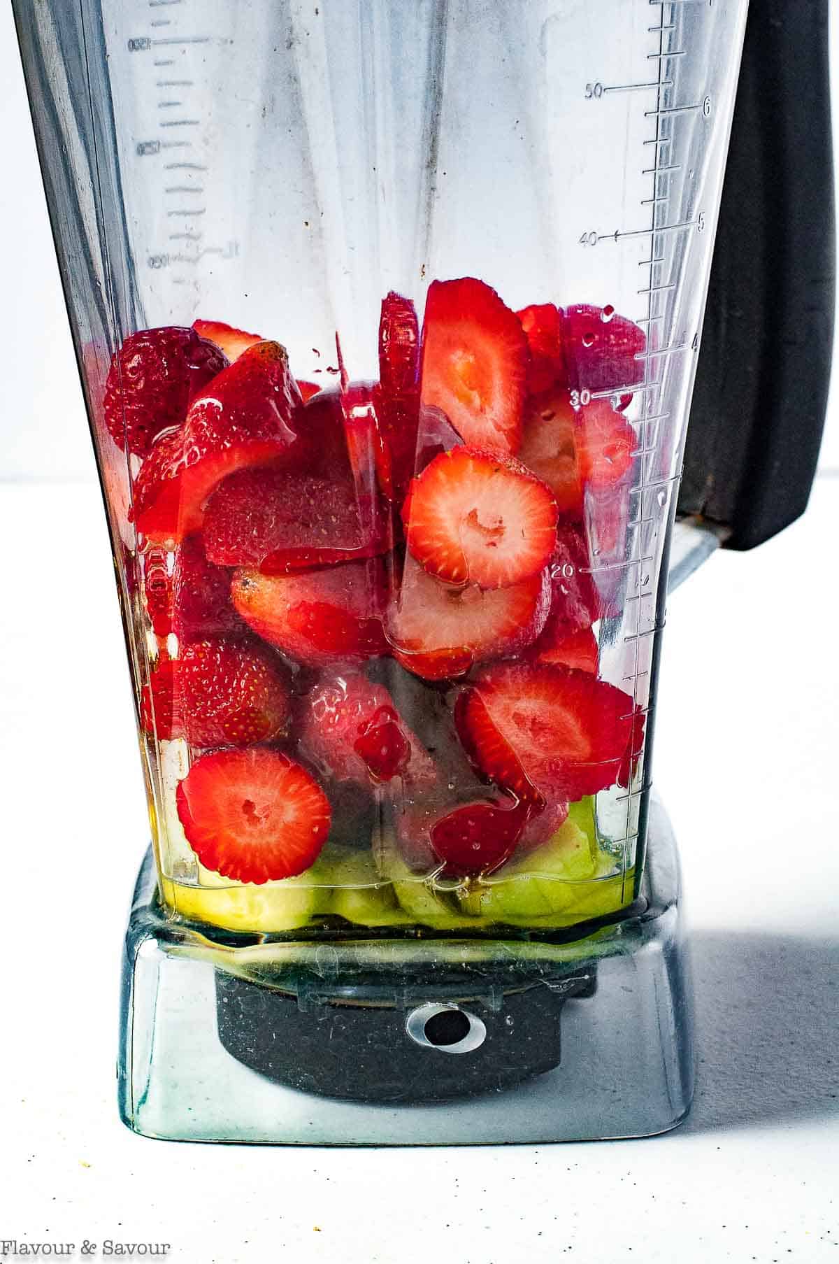 sparkling strawberry limeade ingredients in blender.