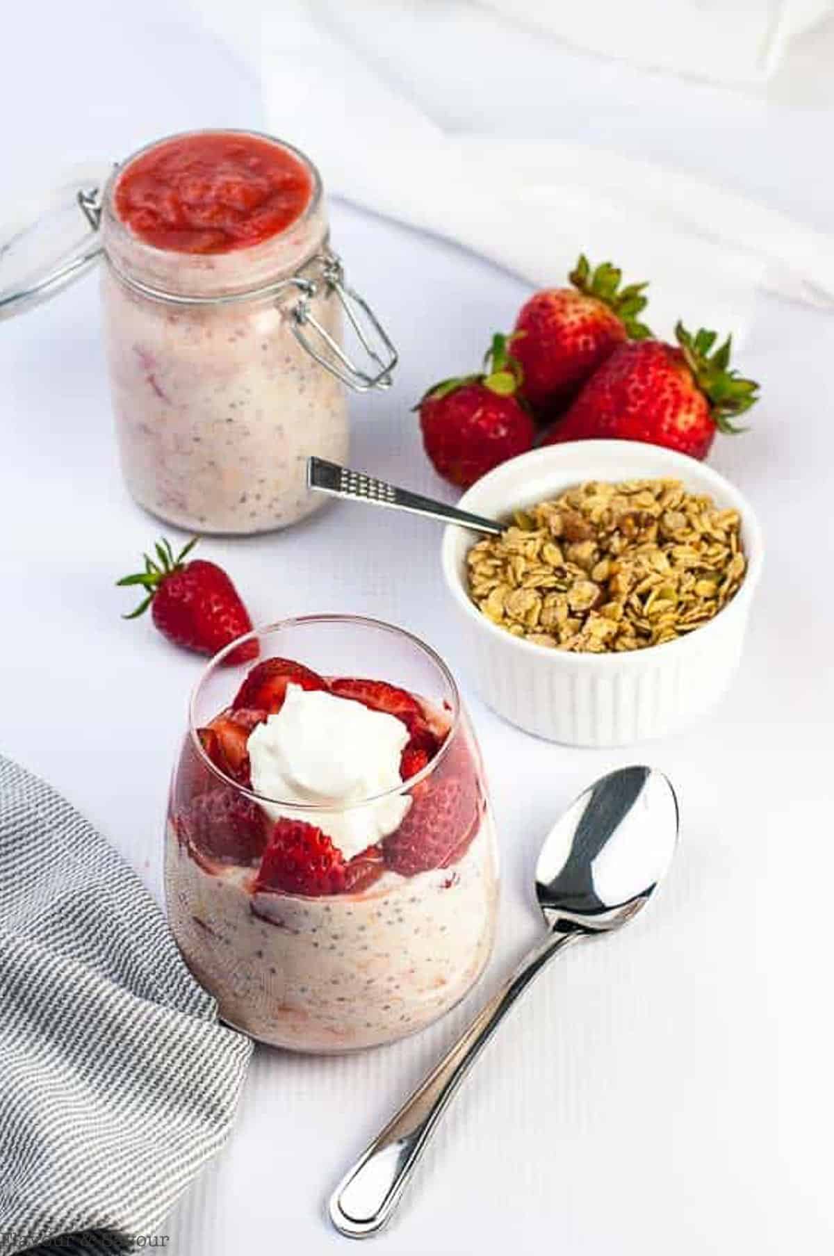 Strawberry Rhubarb overnight oats with fresh strawberries.