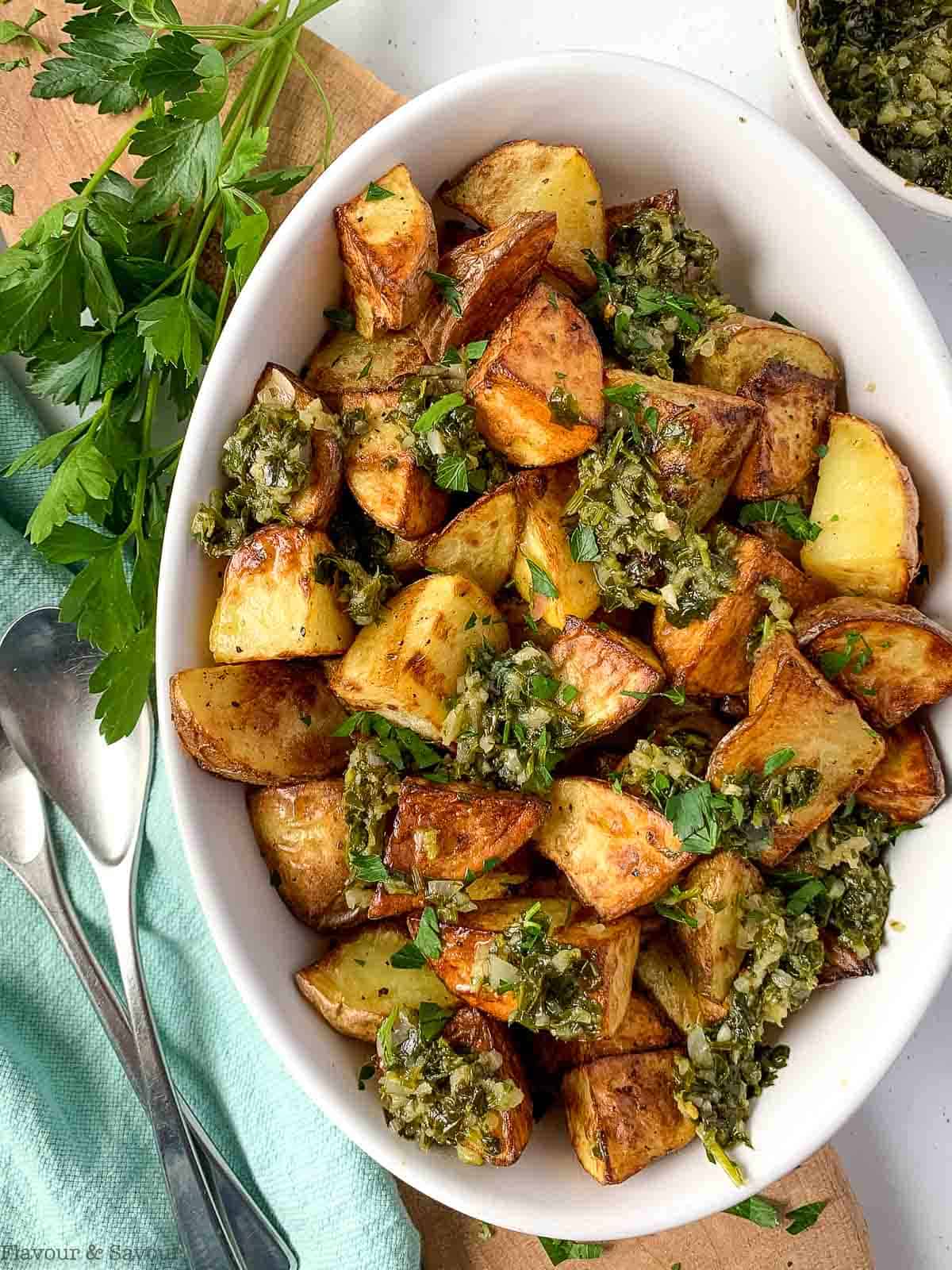 Air fryer roast potatoes with chimichurri sauce and fresh parsley