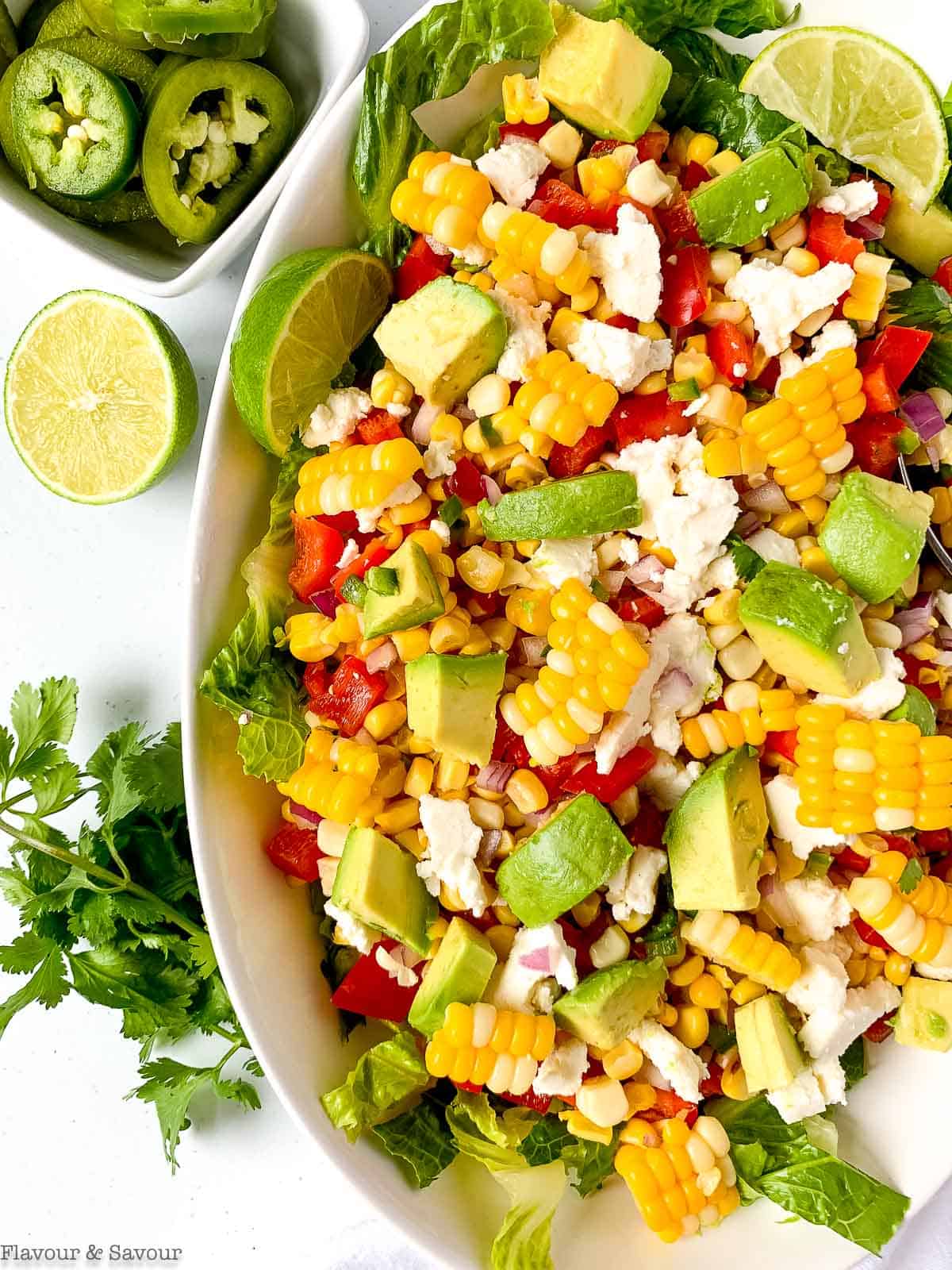Overhead view of Mexican corn salad with questo fresco.