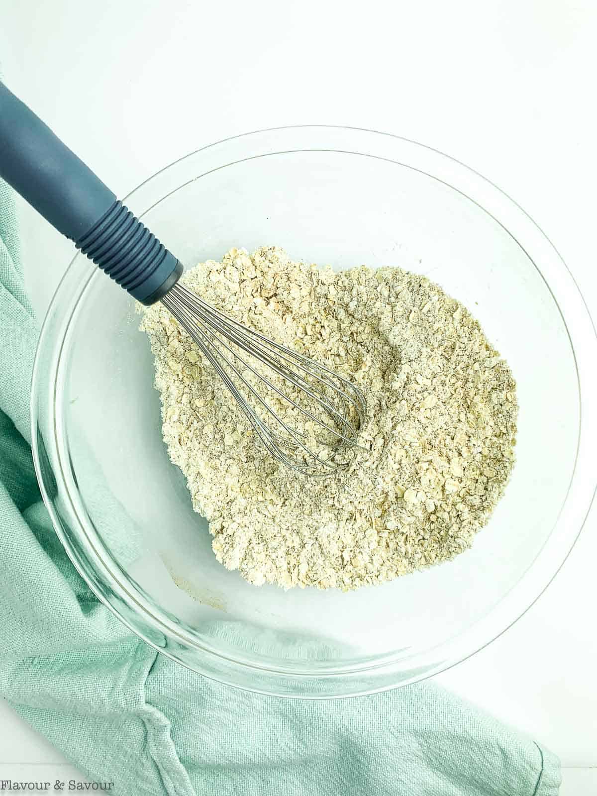 Whisking dry ingredients for blueberry oatmeal breakfast bars.