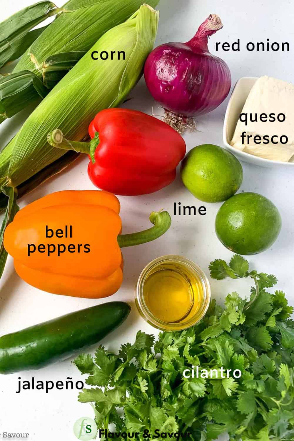Ingredients for Mexican corn salad with labels.