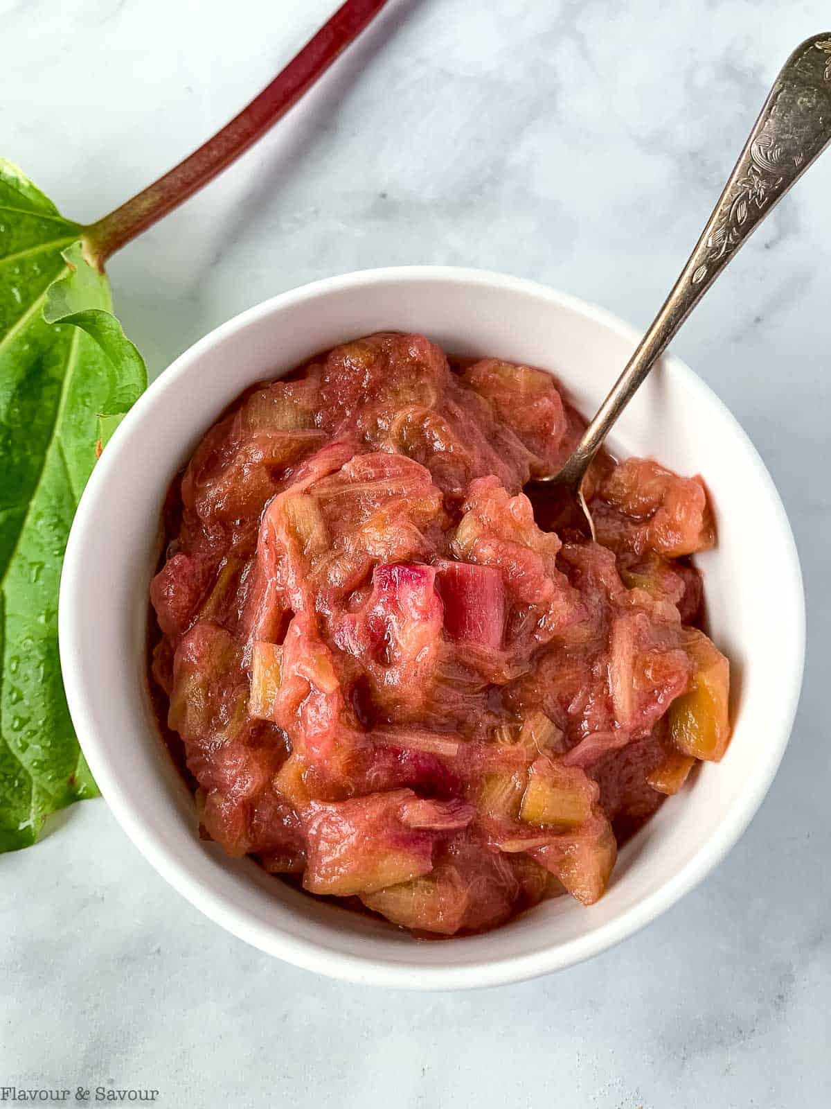 Overhead view of a bowl of rhubarb compote.