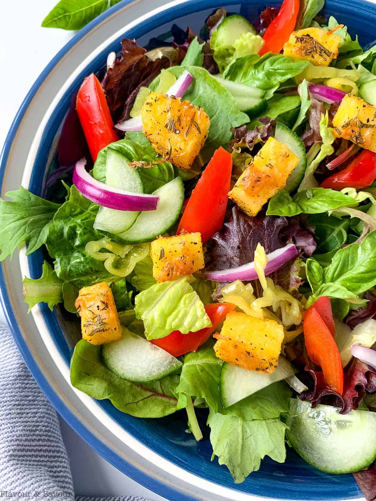 Italian green salad with herbed polenta croutons.