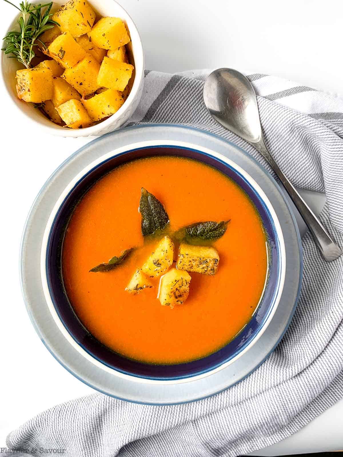 Polenta croutons on carrot-ginger soup.