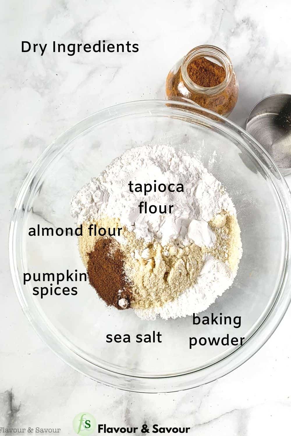 Labelled dry ingredients for almond flour pumpkin muffins.