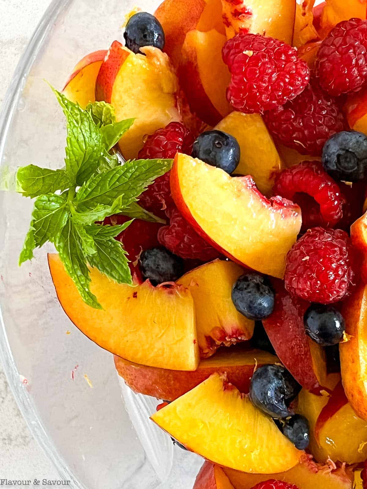 Close up view of a bowl of fruit.