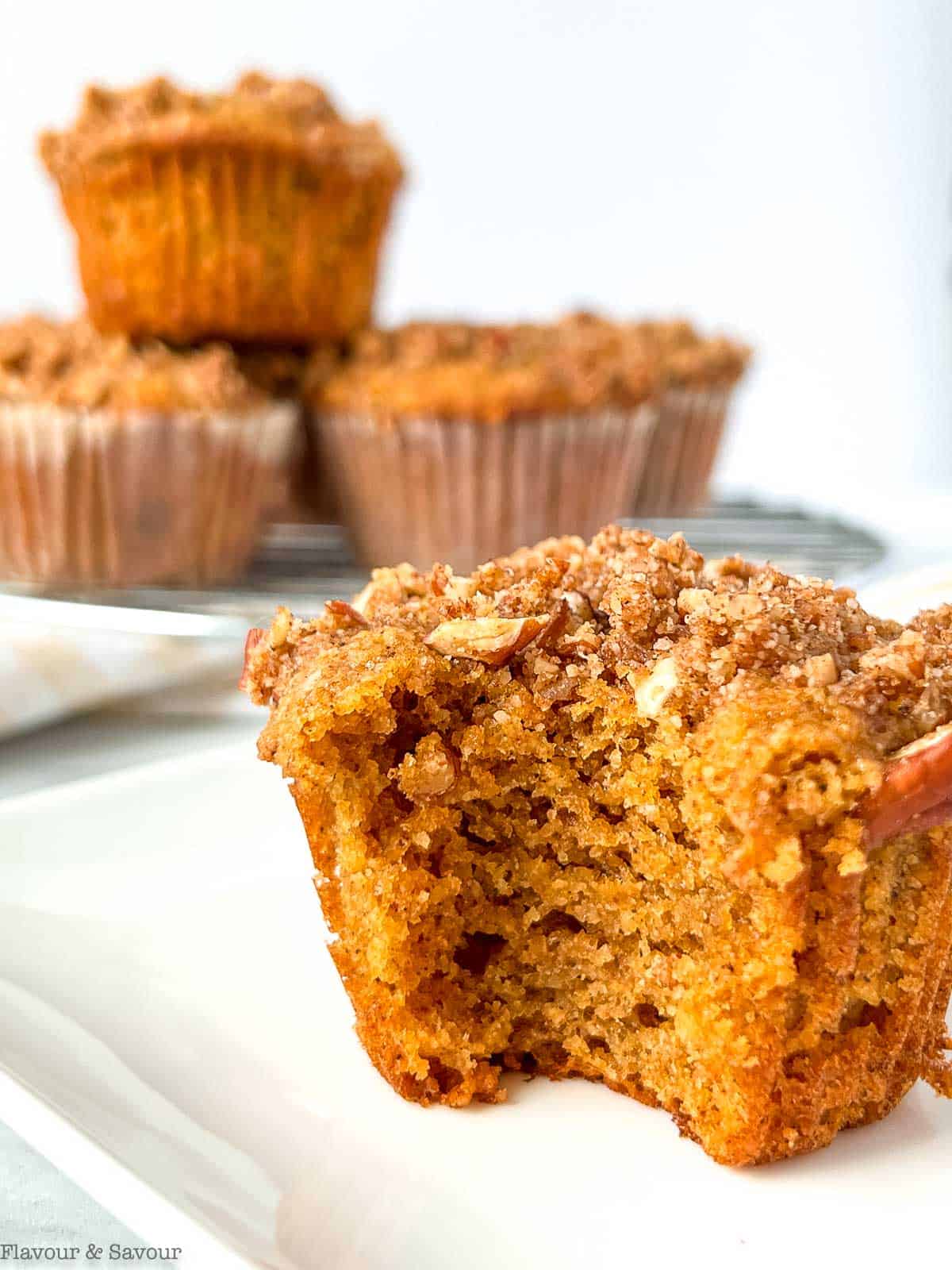 Close up view of an almond flour pumpkin spice muffin showing the inside texture.