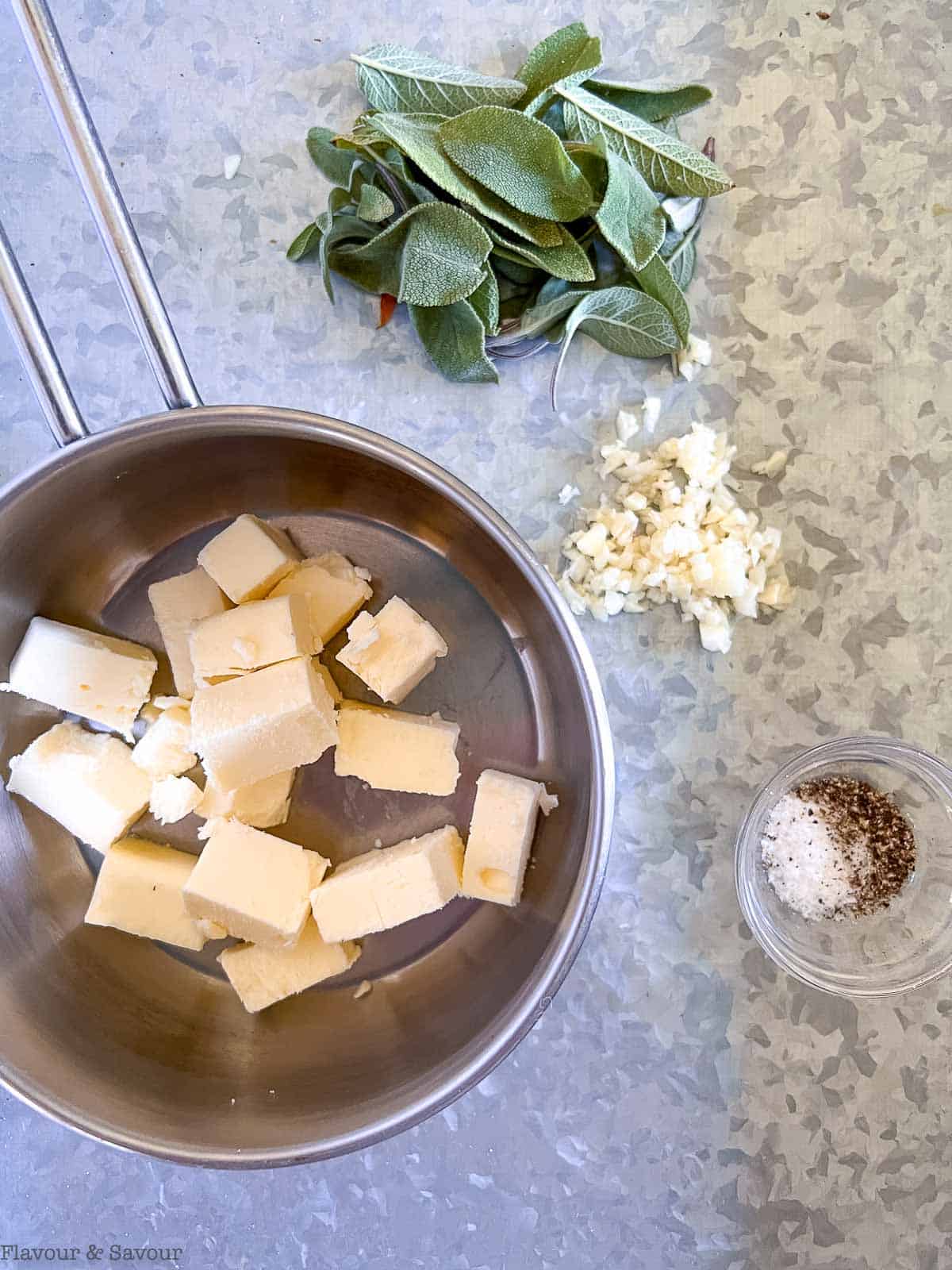 Ingredients for browned butter sage sauce: unsalted butter, sage leaves, garlic and salt and pepper.