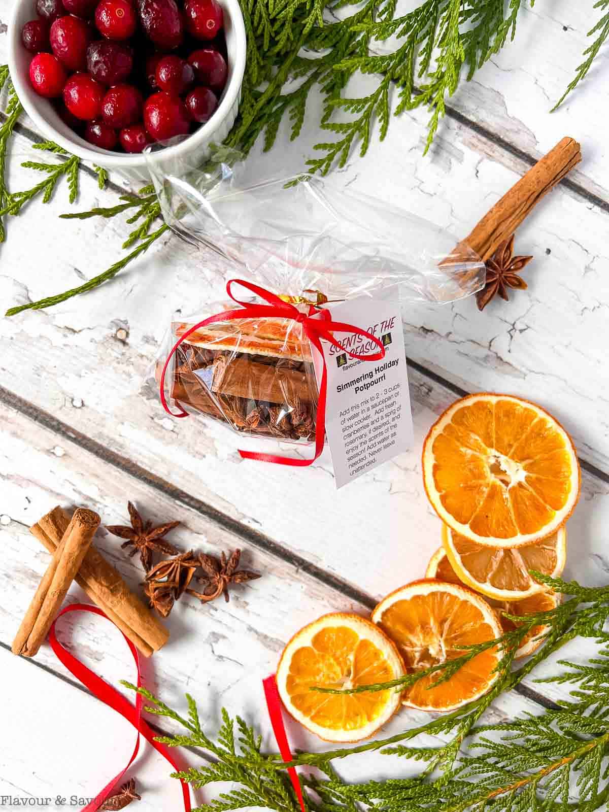 Dried oranges for potpourri spice mix with cinnamon sticks and star anise pods.