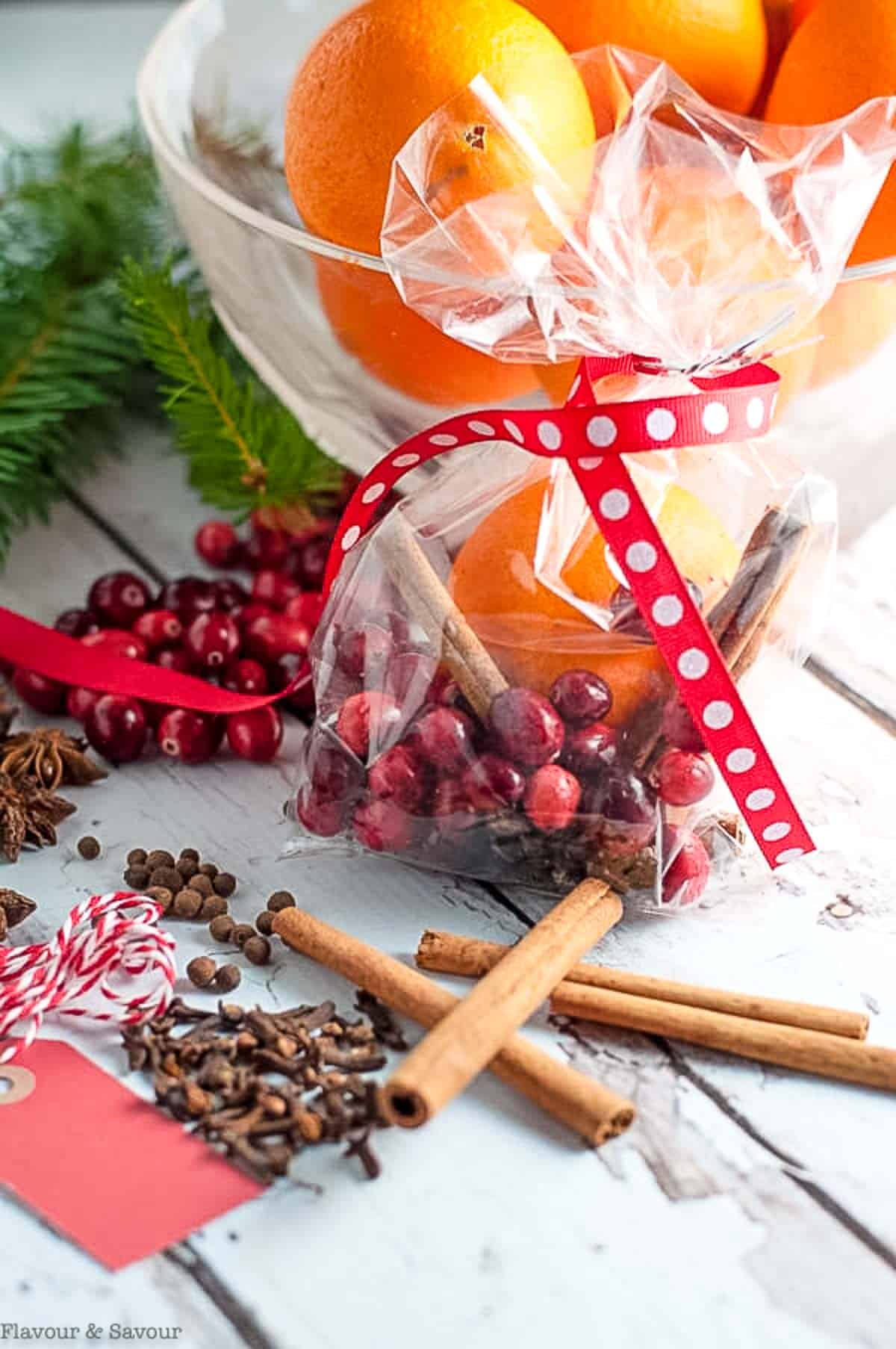 Packaged holiday potpourri with spices, orange and cranberries.