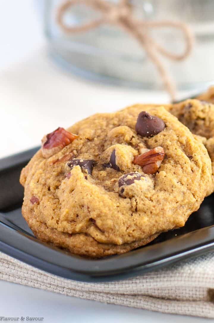 Close up view of a gluten-free pumpkin pecan cookie.