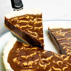 A slice of chocolate pie with peanut butter swirl.