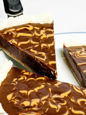A slice of chocolate pie with peanut butter swirl.