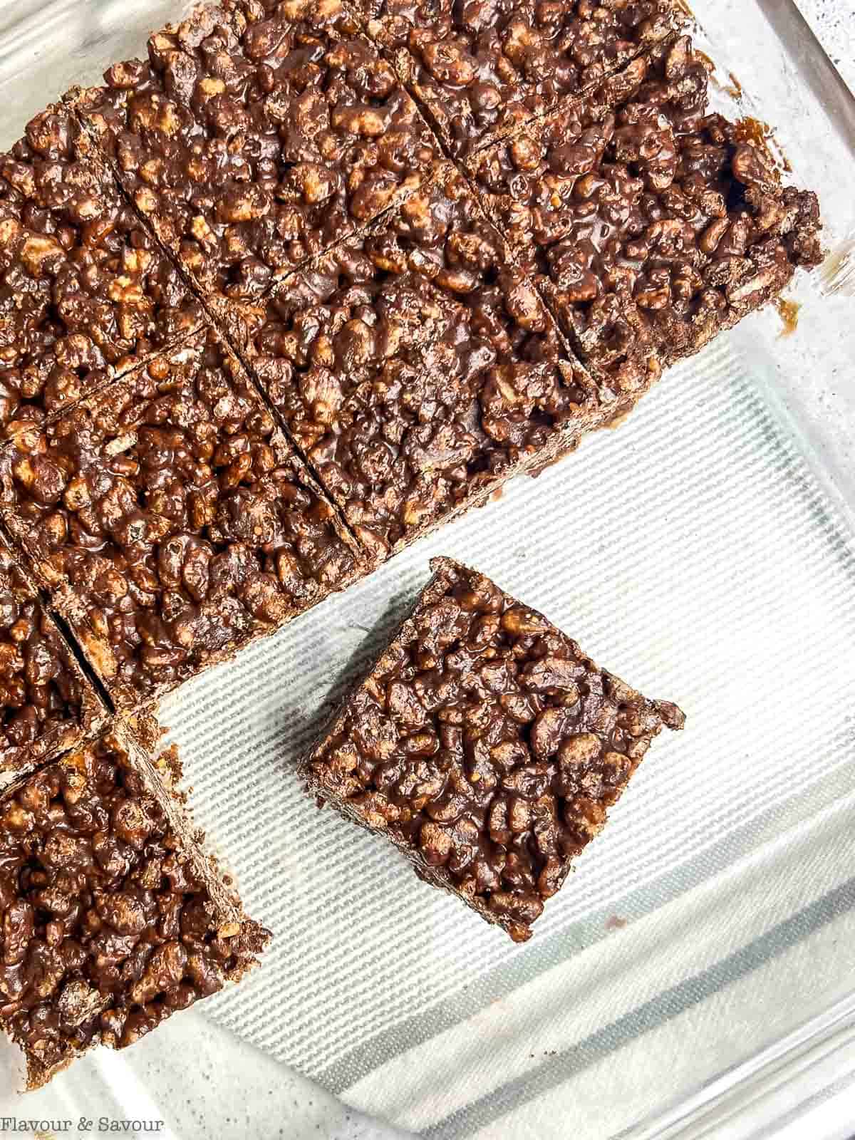 A baking pan with no-bake chocolate peanut butter rice krispie squares.
