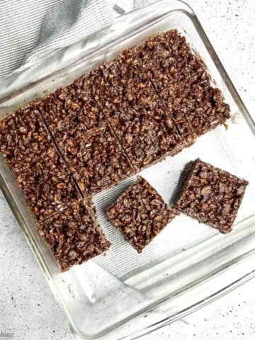 Chocolate Peanut Butter Rice Krispie squares in a glass baking pan.