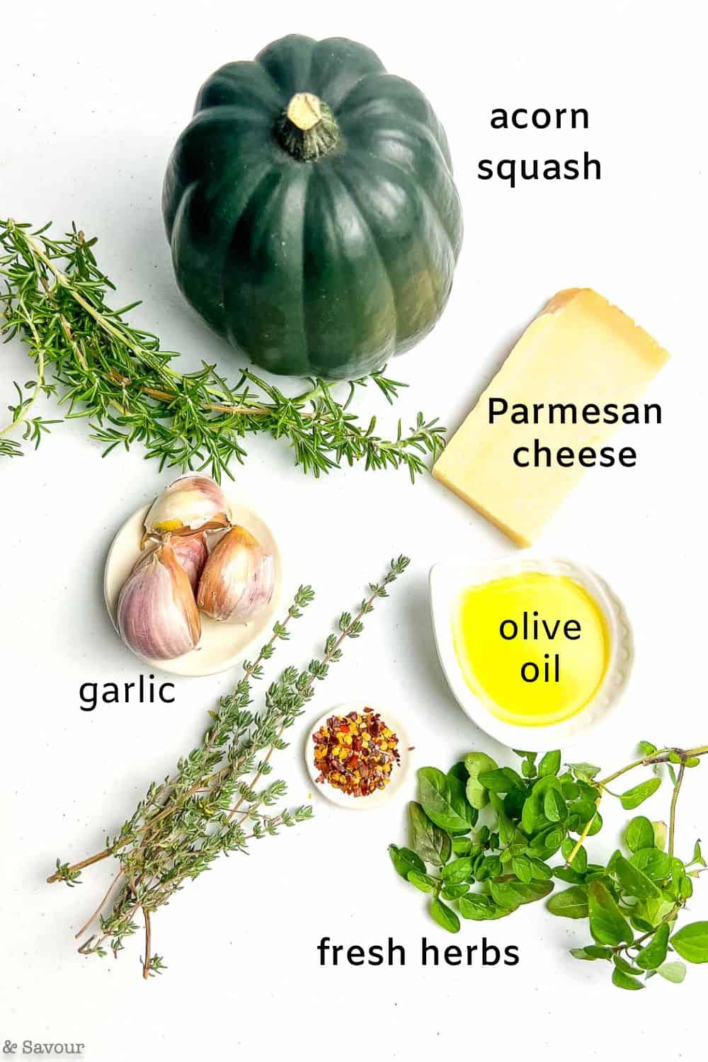 Ingredients with labels for garlic parmesan roasted acorn squash.