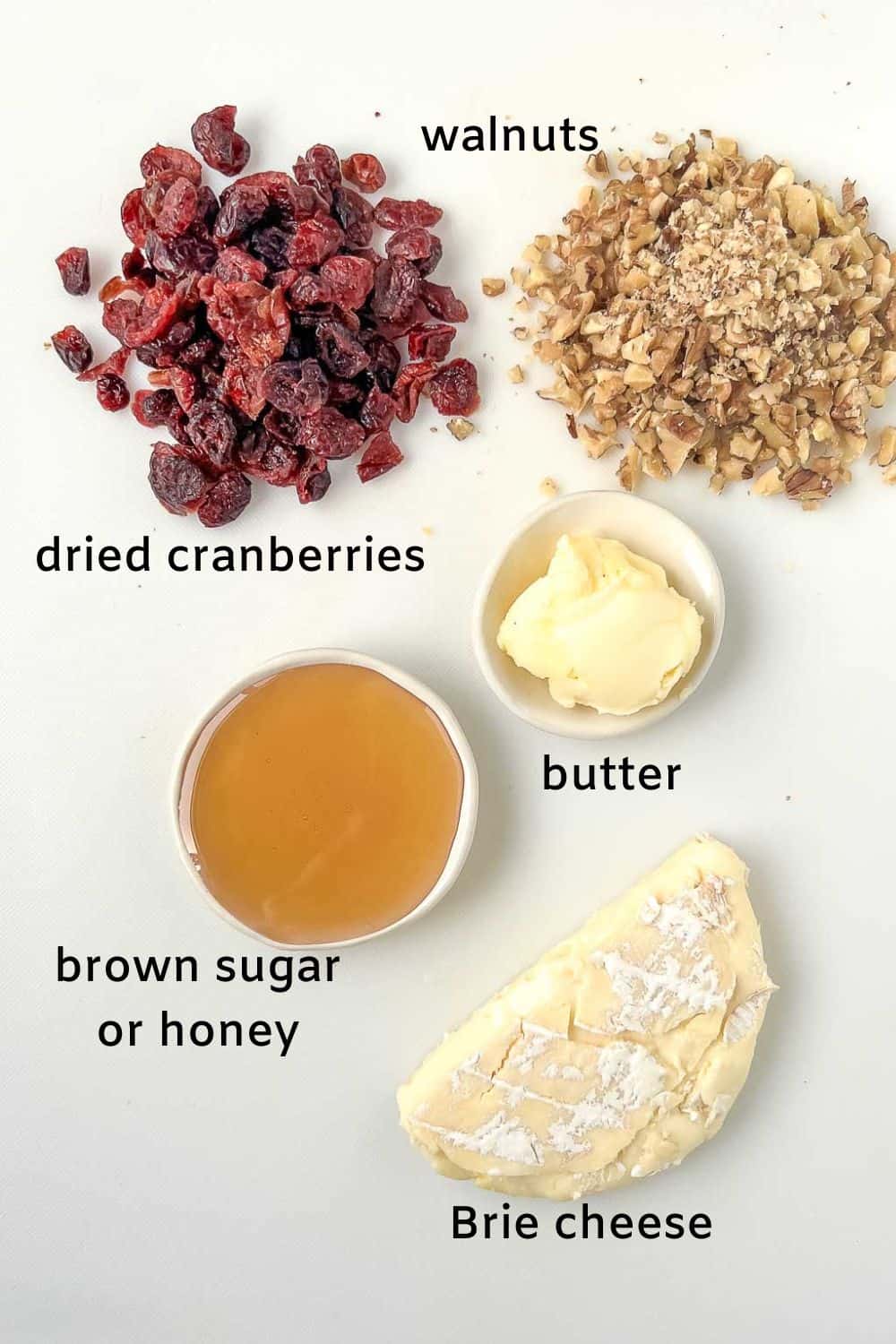 Labelled ingredients for puff pastry cranberry brie pinwheels.