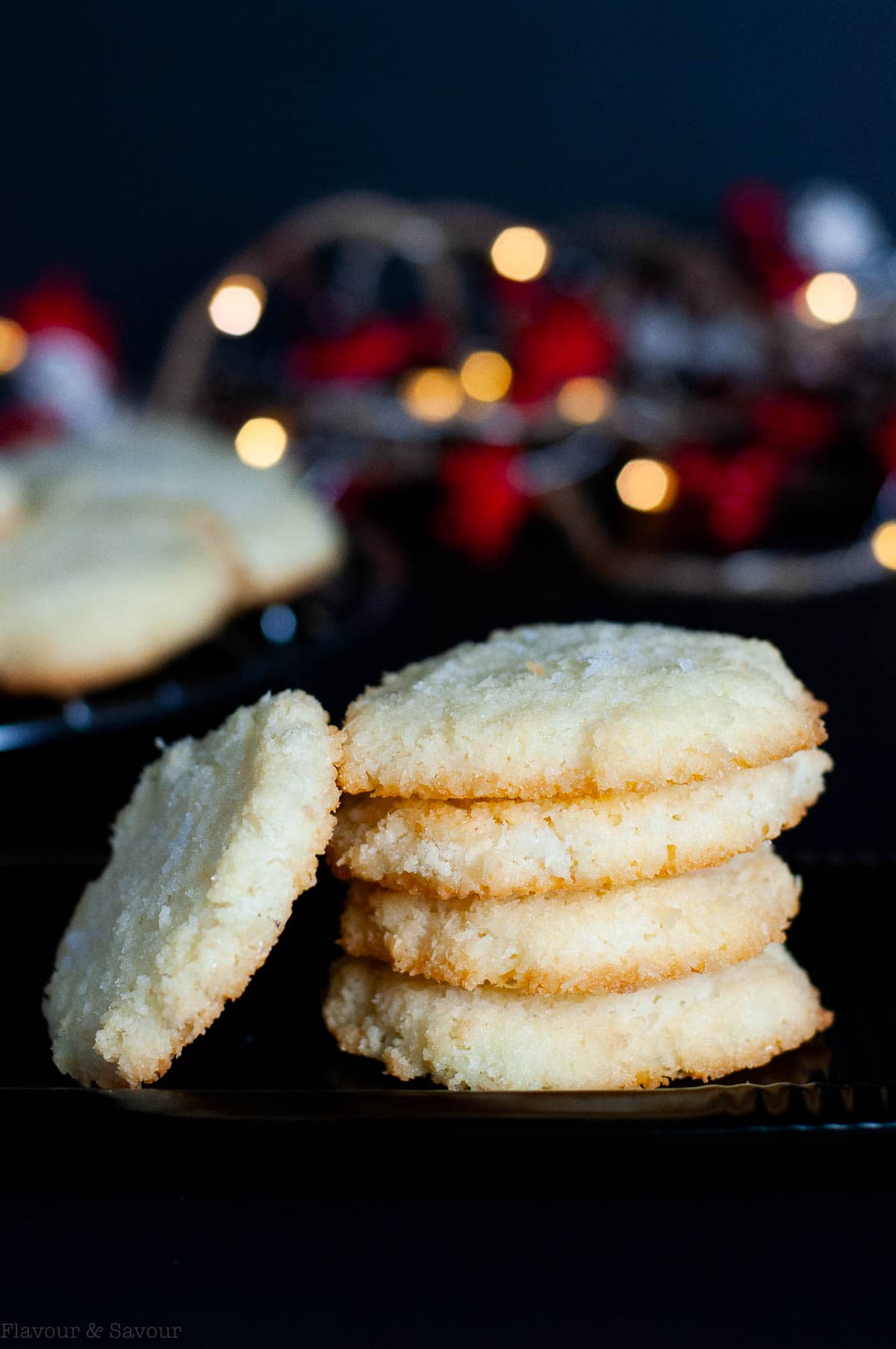 A stack of crispy salted coconut cookies.