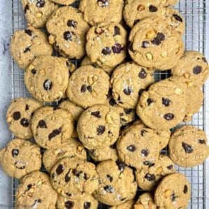 Gluten-free kitchen sink cookies on a wire cooling rack.