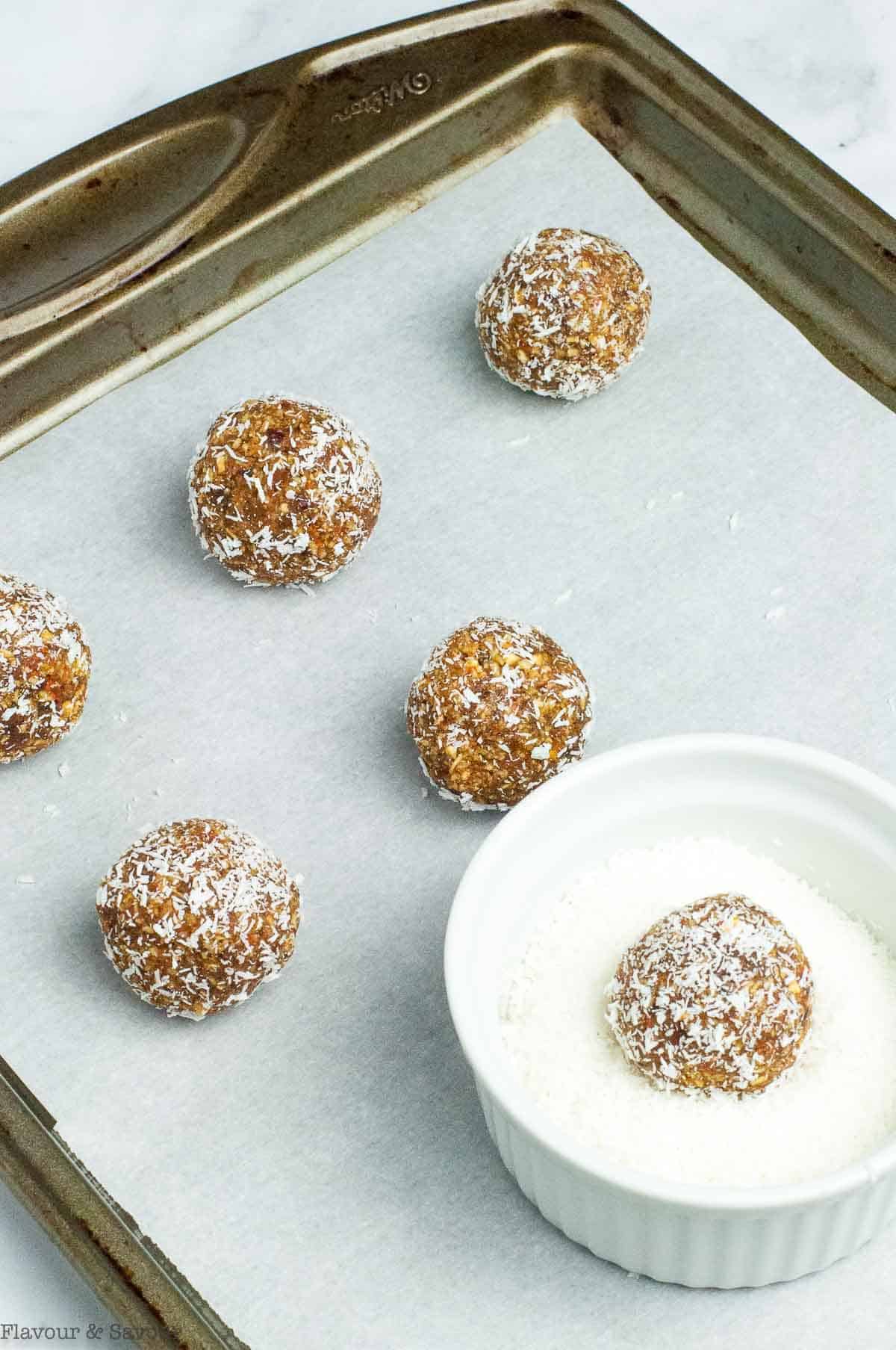 Energy balls rolled in coconut.