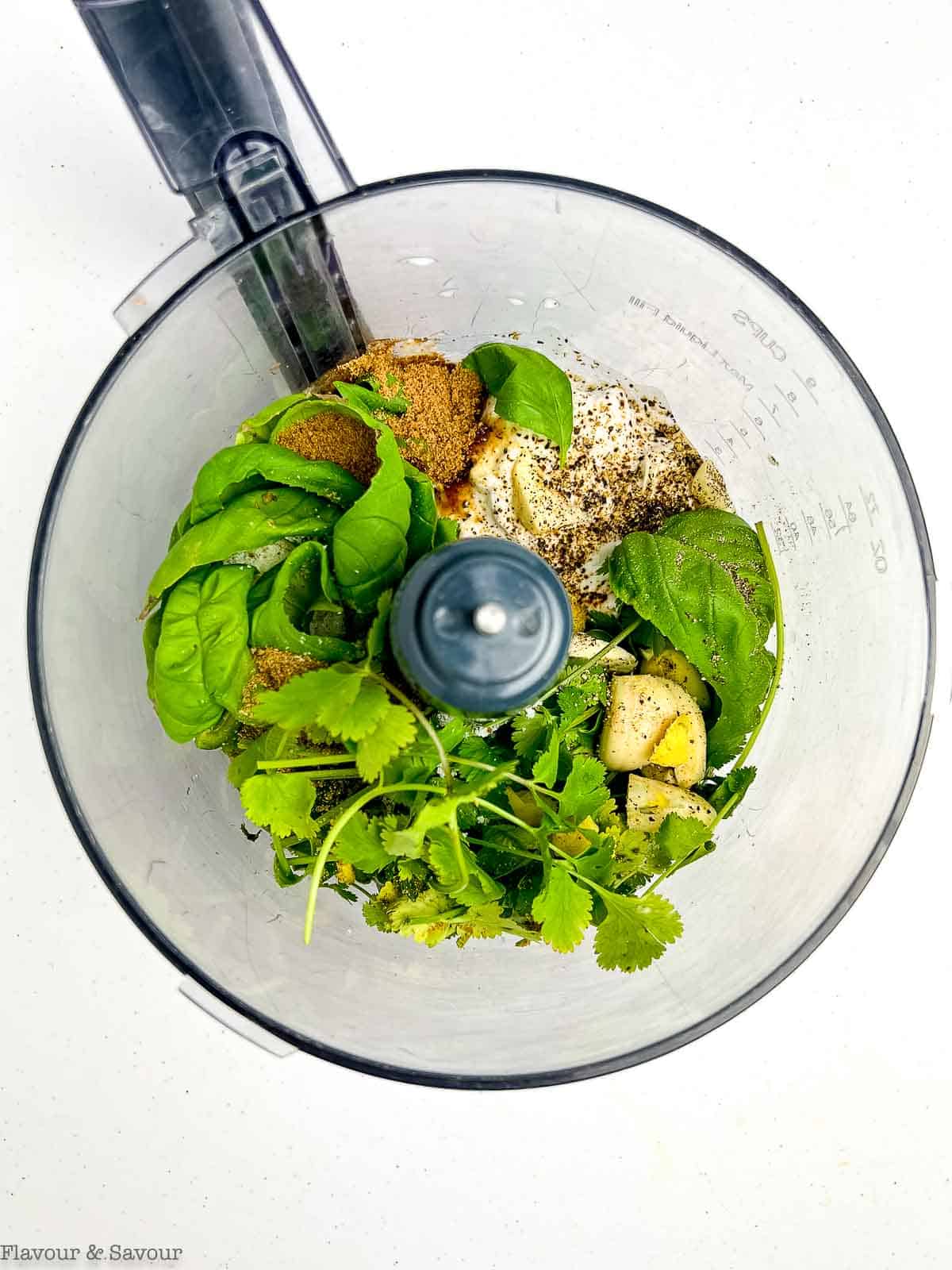 Ingredients for Thai chicken marinade in a food processor bowl.