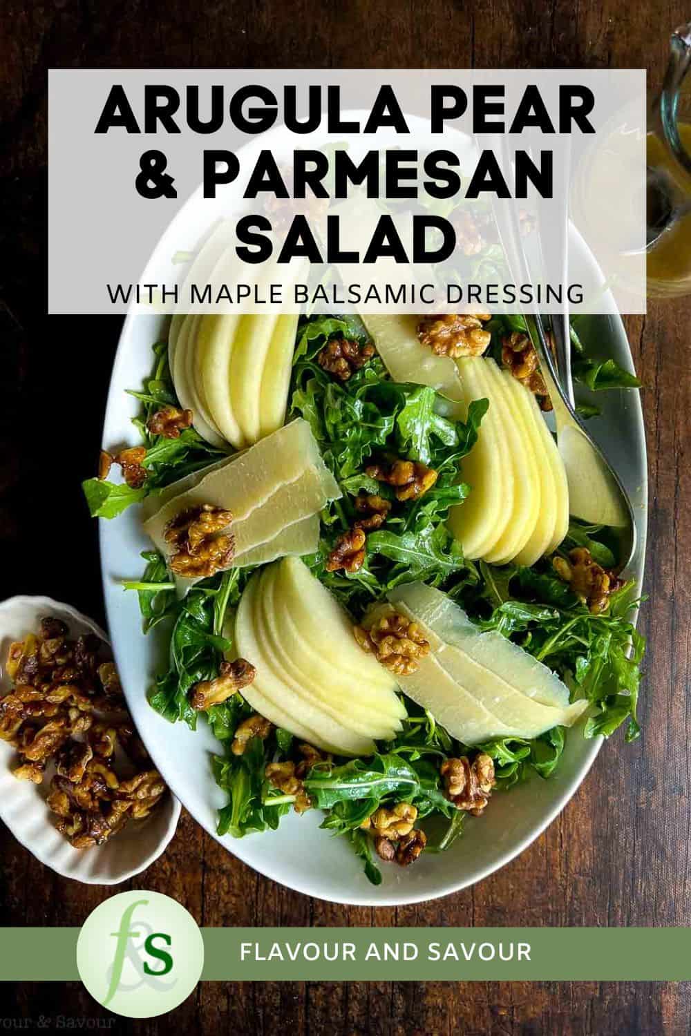 Image with text overlay for arugula, pear and Parmesan salad with maple walnuts.