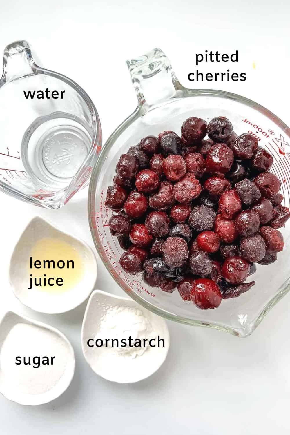 Ingredients to make a simple cherry sauce.
