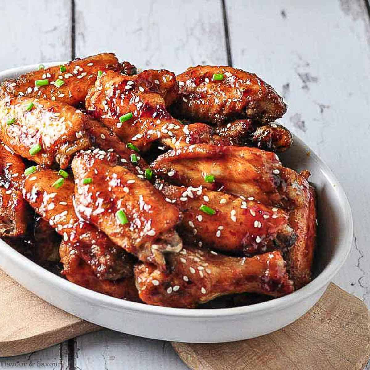 Close up view of chipotle honey-mustard glazed chicken wings.