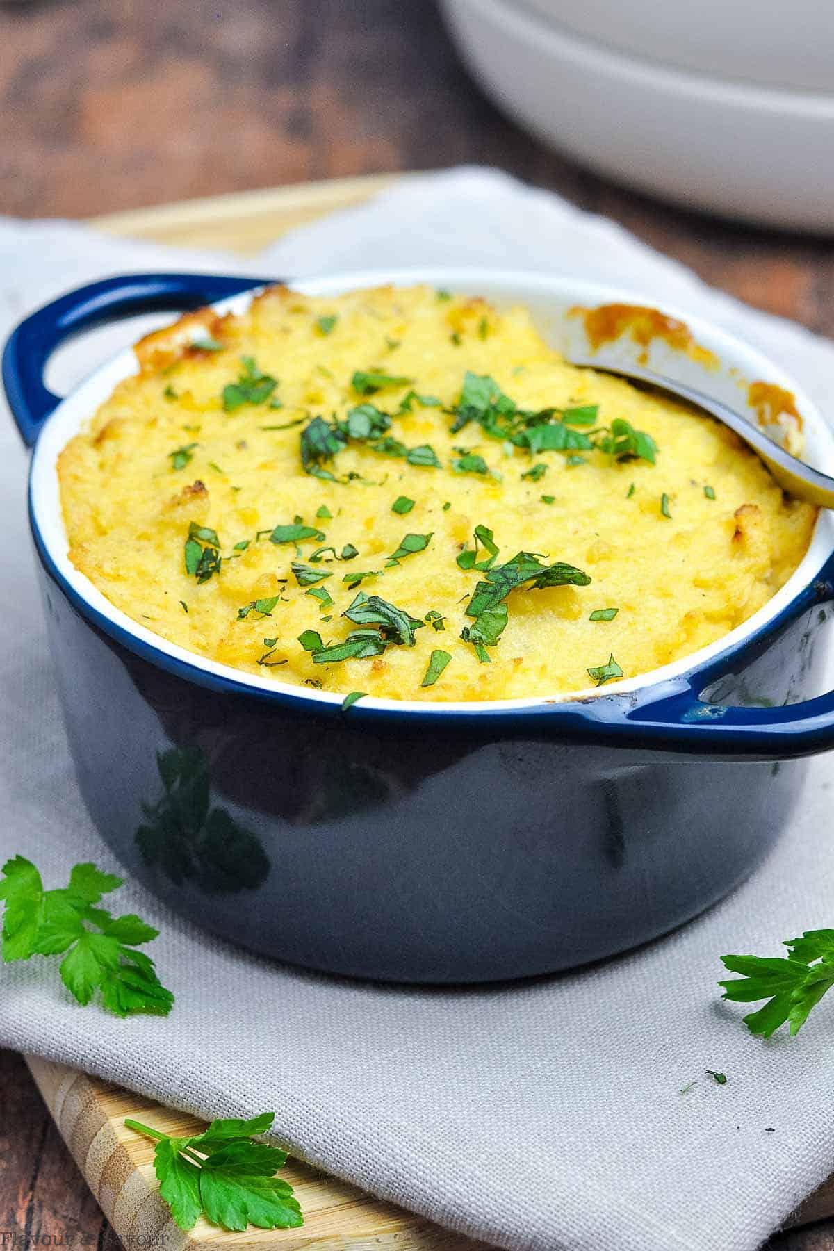 Shepherd's pie cooked in a mini cocotte dish.