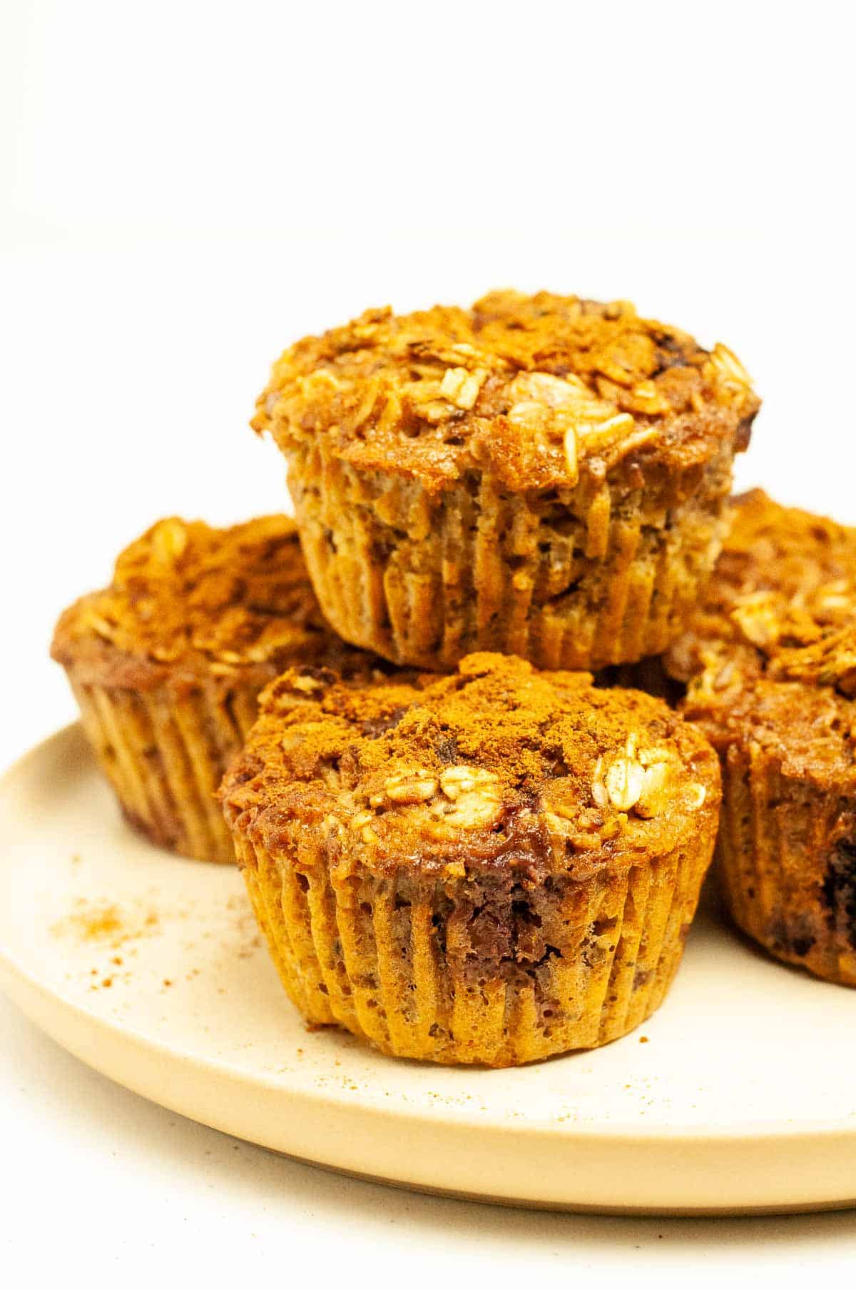 Cherry Baked Oatmeal Cups stacked on a plate.