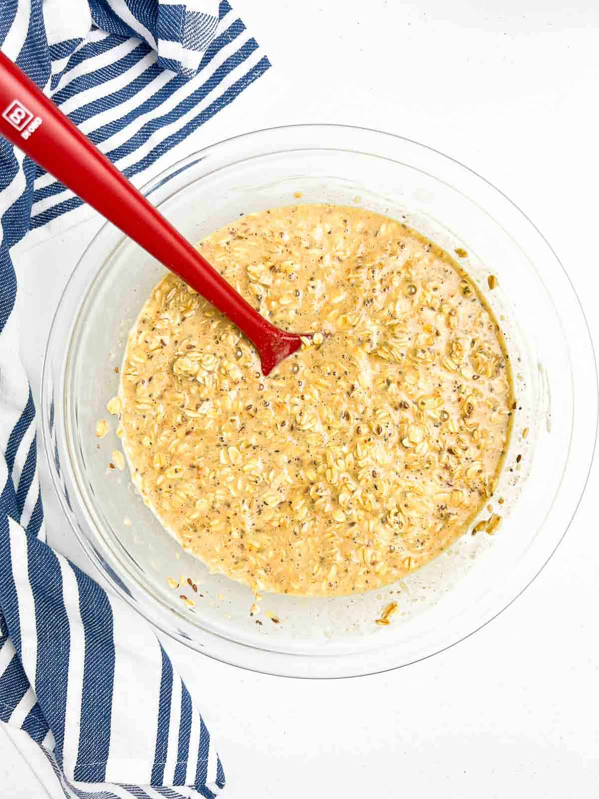 Combined wet and dry ingredients for cherry baked oatmeal.