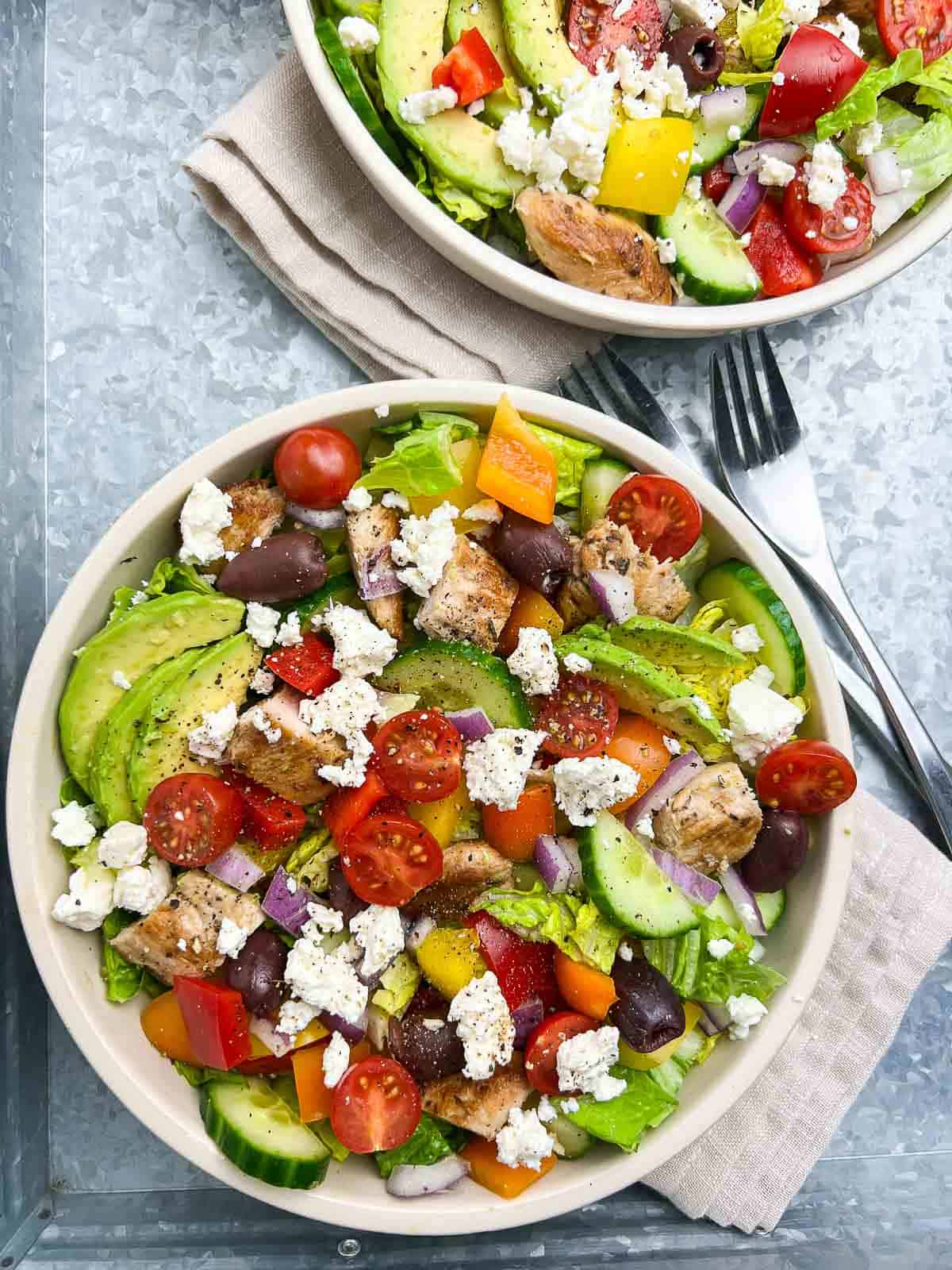 Overhead view of a bowl of Greek Chicken Cobb Salad.